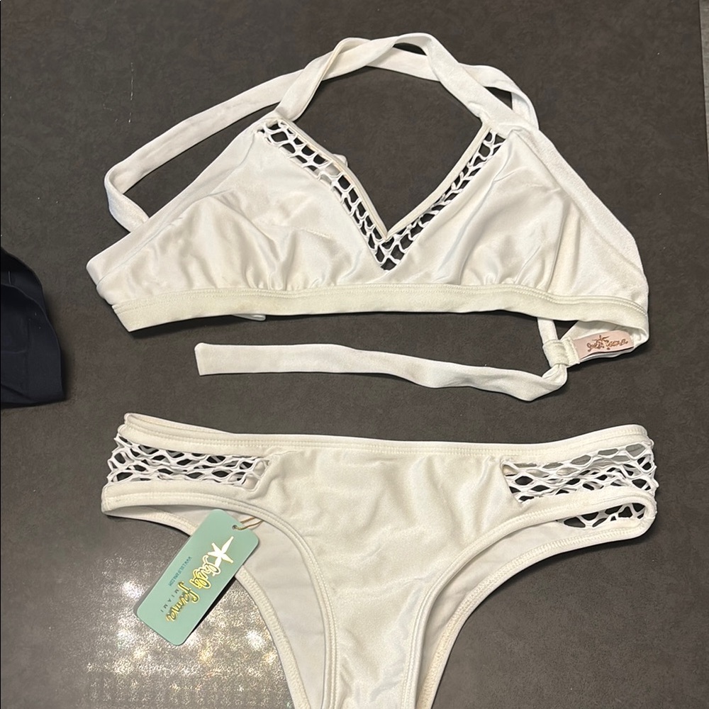 Luli Fama White Bikini Net Accents. Halter style tie in back top L Bottom small